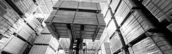 cover image showing a forklift hoisting a pallet of crates into the air